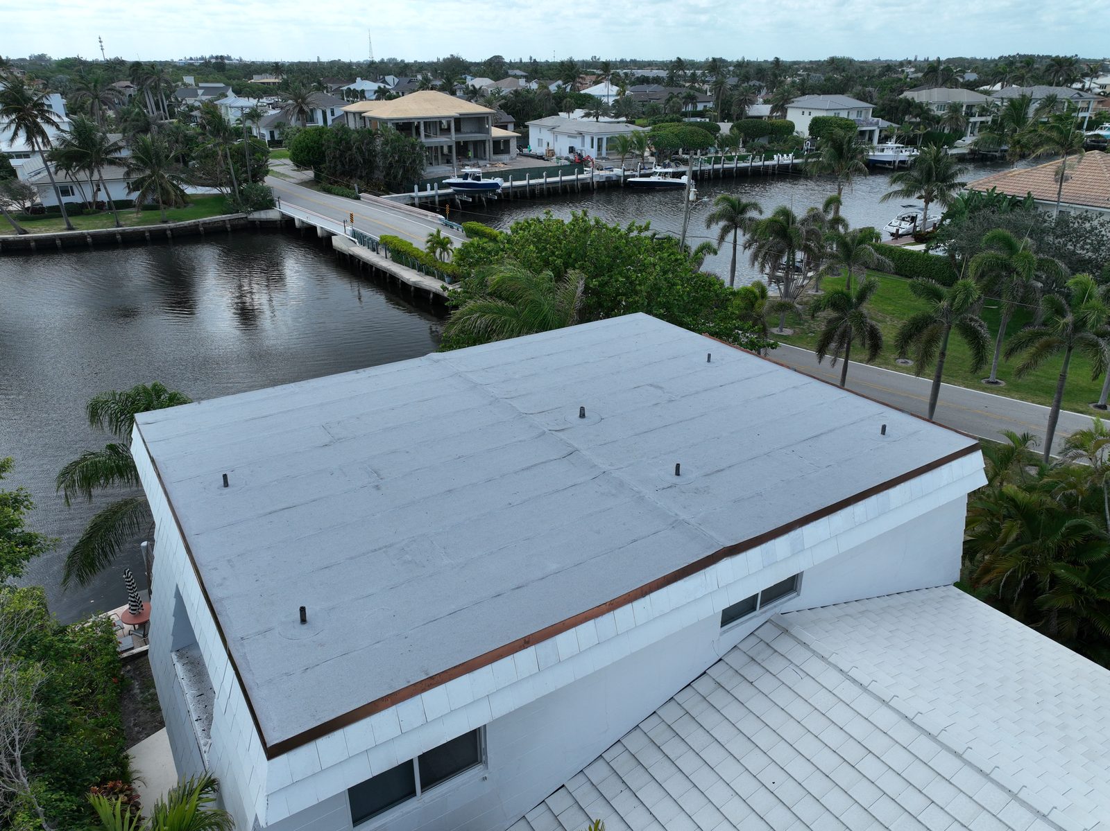 Waterfront commercial flat roof replacement in South Florida