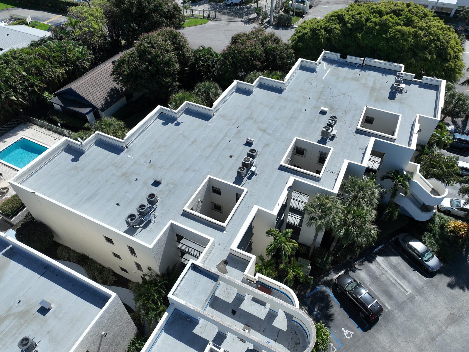 Commercial low slope roof replacement on a multi story building