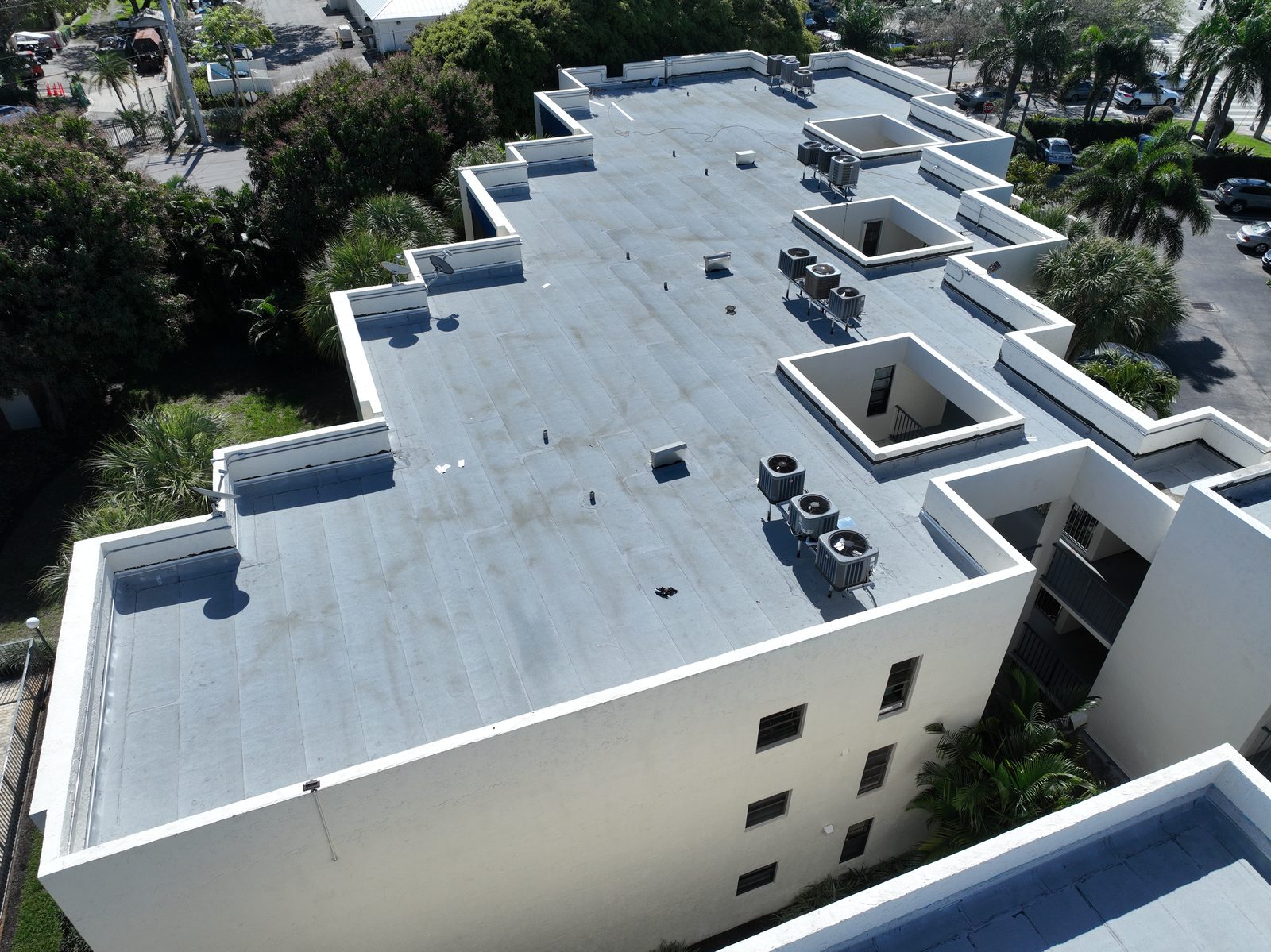 Commercial roof replacement with rooftop equipment