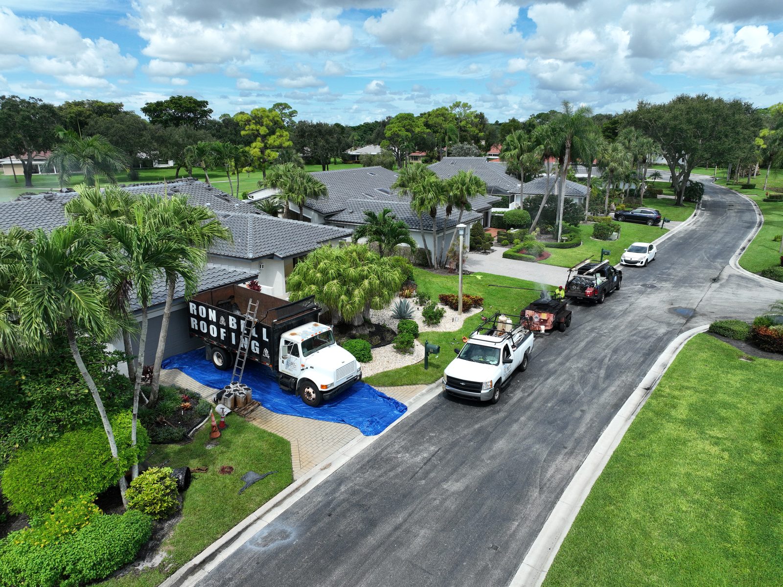 Ron Bell Roofing crew on site at a South Florida roof replacement