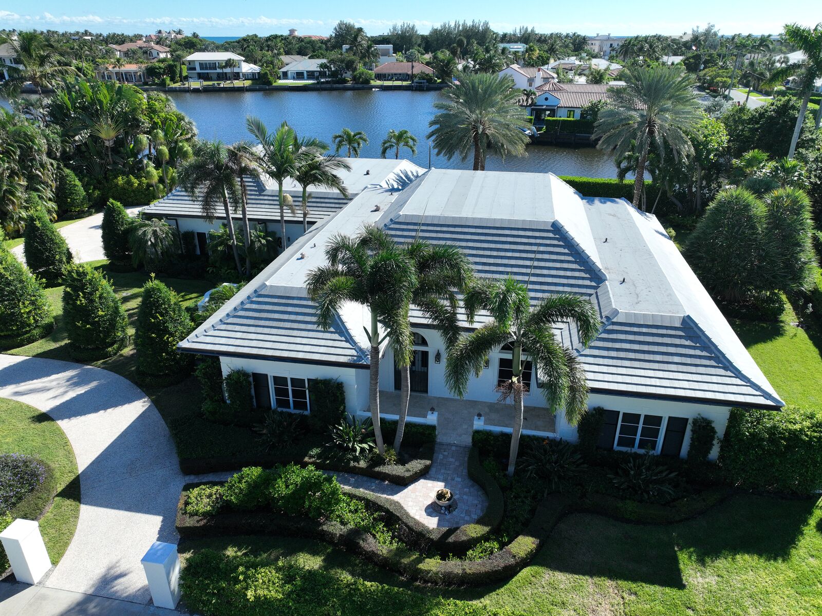 Waterfront estate flat tile roof replacement in South Florida