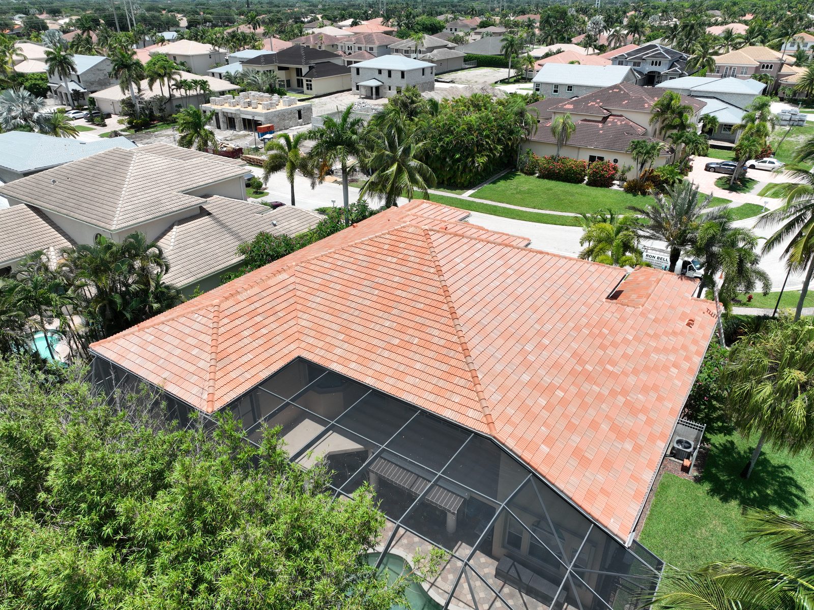 Tile roof replacement with pool enclosure in South Florida